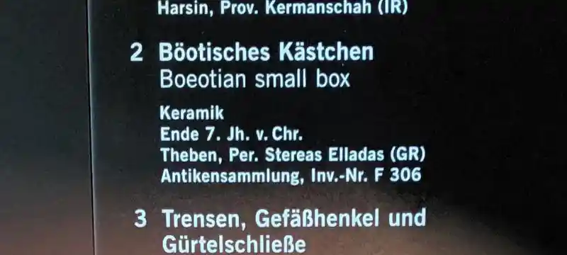 Boeotian small box from Thebes with painted goddess, lion, swastikas and solar symbols late 7th century BC